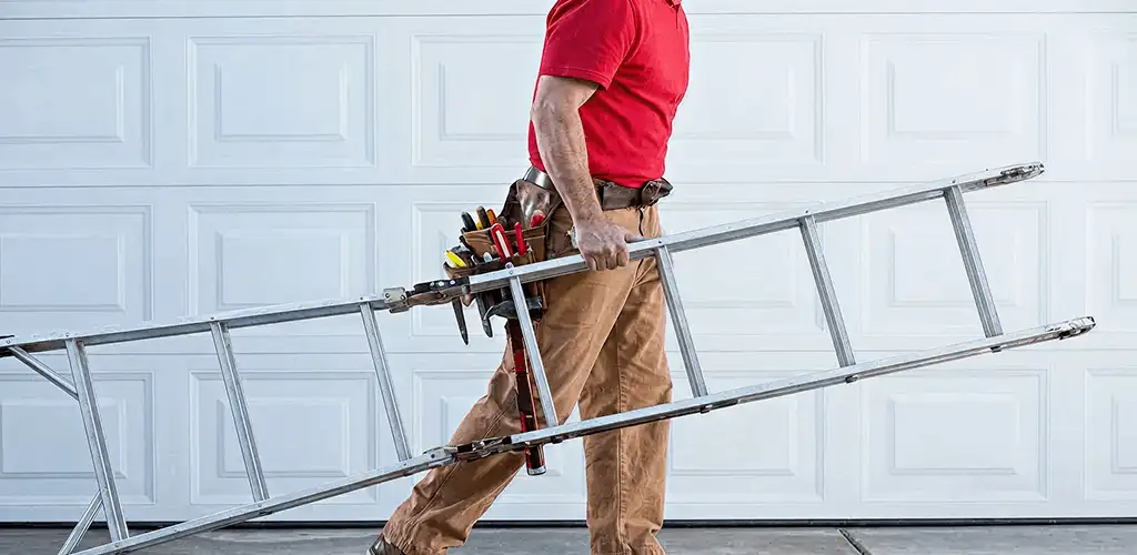 Garage door repair technician arriving with tools and ladder in Chicago, IL