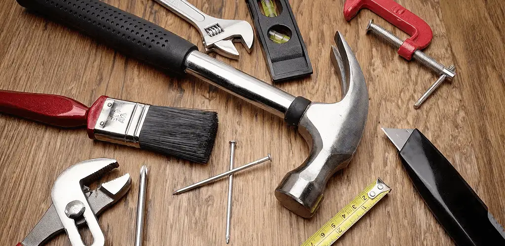Handyman tools laid out for home repair and maintenance work in Chicago, IL