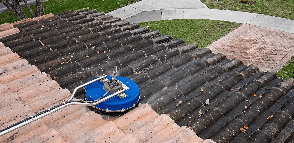 Roof pressure cleaning removing debris and buildup from roof tiles in Chicago, IL
